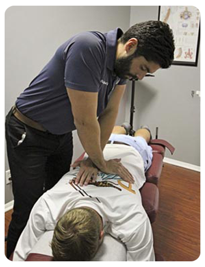 Chiropractor-Fort-Lauderdale-FL-Rafael-Sierra-Adjusting-His-Patient-LP